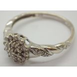 9ct white gold flower head diamond ring size V 0.