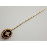 Yellow metal diamond and onyx set Edwardian stick pin