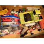 Box of vehicles including unopened Hot Wheels Ferrari and Tonka road panel