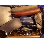 Box of mixed prescription glasses and sunglasses