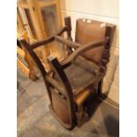 Two leather dining chairs