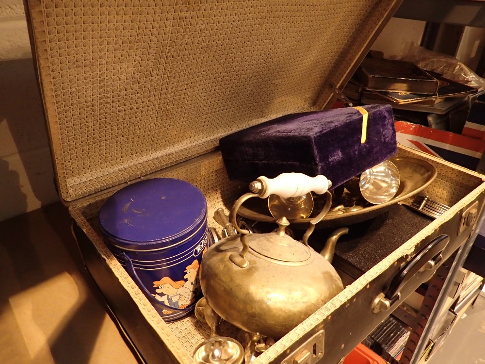 Vintage suitcase containing brass and silver plate