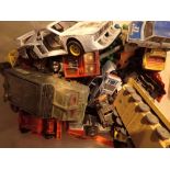 Box of playworn diecast cars