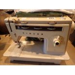 Singer model 514 sewing machine CONDITION REPORT: All electrical items in this lot