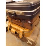 Four vintage suitcases