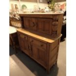 Ercol light elm court cupboard