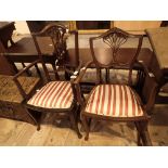 Two Edwardian side chairs both with delicately carved detail to back upholstered in wine and cream