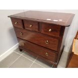 Stag chest of three short over two long drawers