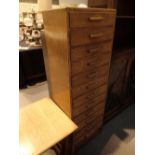 Narrow set of twelve oak drawers with mother of pearl inlay to handles 44 x 33 x 130 cm H