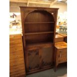 Oak bookcase with lead glazed cupboard below 87 x 29 x 183 cm H