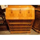 Drop front four drawer bureau in yew