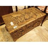 Heavily carved Chinese camphor wood chest