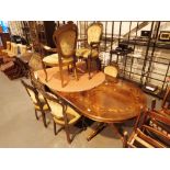 Italian inlaid dining table with heavily carved base six upholstered chairs including two carvers