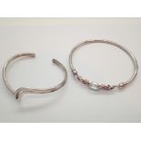 Two ladies boxed 925 silver bangles