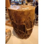 Ethnic tree log drum with skin