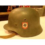 SS helmet with later decals and numbered