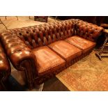 Red leather Chesterfield button back thr