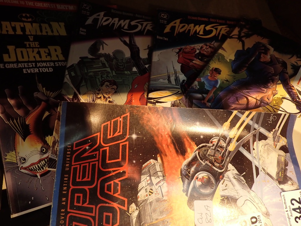 Four DC books including Adam Strange