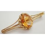 14ct gold brooch set with a large citrin