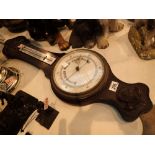 Carved mahogany barometer ceramic face g