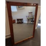 Large stained pine wall mirror CONDITION REPORT: 75 x 105 cm