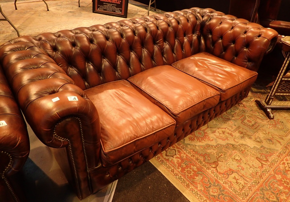 Red leather Chesterfield button back three seater settee