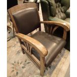 Art deco leather upholstered low armchair