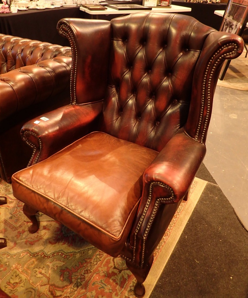 Red leather Chesterfield button back wingback chair