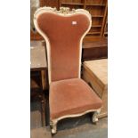 Low high back chair with gilt decoration