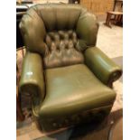 Button back Chesterfield green leather armchair