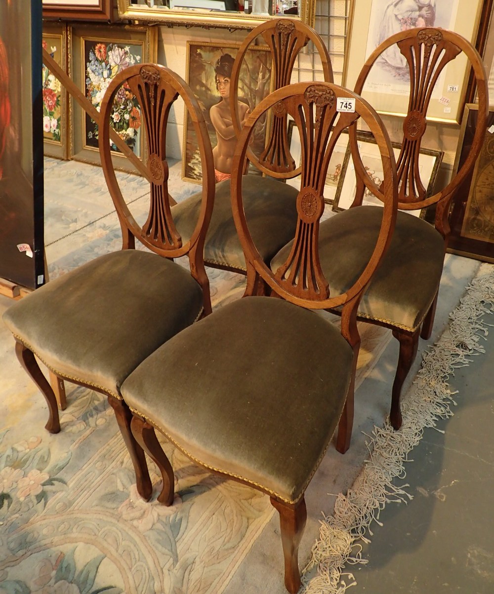 Four Edwardian oak back upholstered dining chairs
