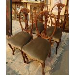 Four Edwardian oak back upholstered dining chairs