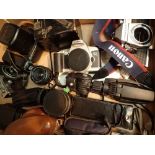 Mixed lot of cameras and lenses including Canon Zenit Practica etc