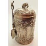 White metal Indian tea caddy with tea and spoon