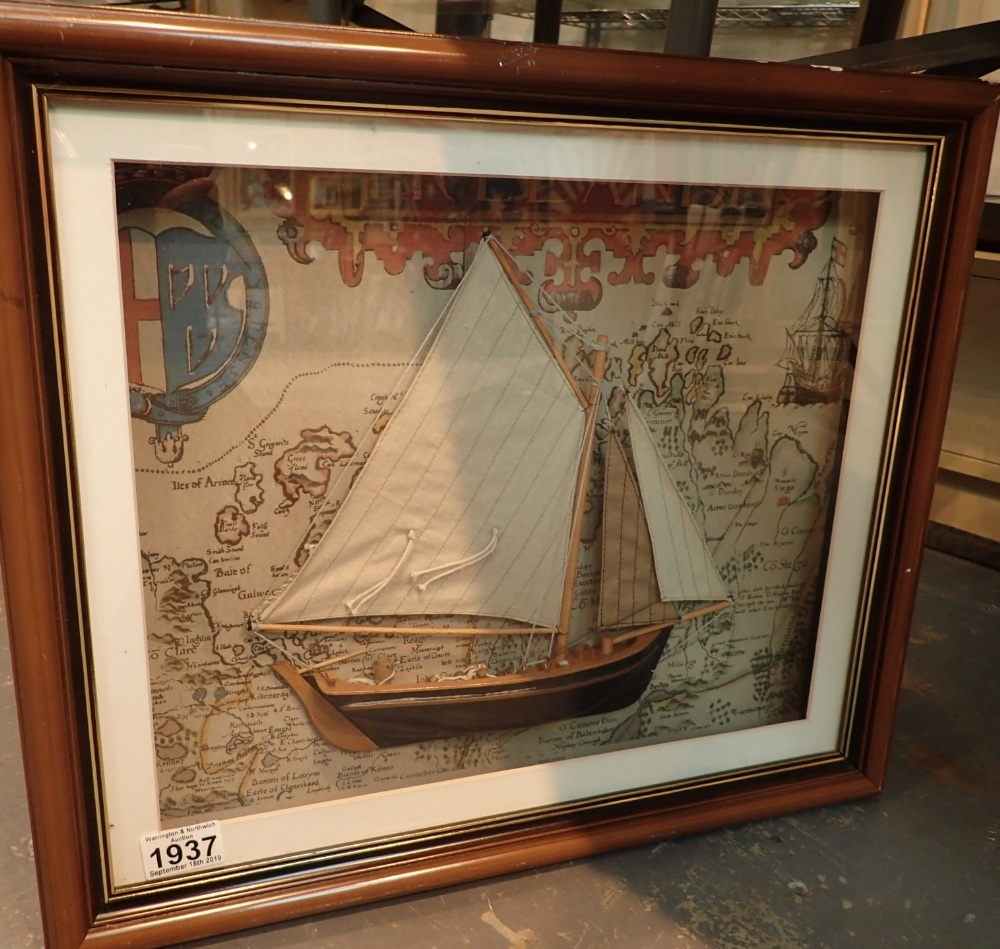 Framed and glazed model half ship on a background map of Ireland