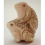 Antique ivory netsuke of two toads