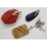 Sterling silver necklace with three natural stone pendants