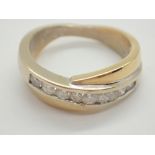 18ct gold cross over diamond half eternity ring containing a total of 0.5cts size L 6.