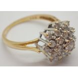 18ct gold diamond cluster ring containing a total of 1ct of diamonds size P 4.