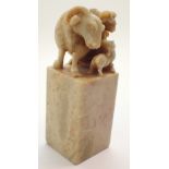 20thC Chinese hardstone seal carved to base with goat finial H: 11 cm CONDITION REPORT: