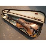 Antique violin lacking label with two piece back in case with bow stamped Czechoslovakia