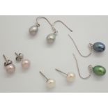 Four pairs of genuine pearl and silver earrings