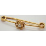 15ct gold bar brooch set with a single pearl 2.