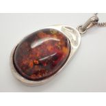Fully hallmarked sterling silver large amber pendant on silver chain
