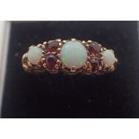 9ct gold opal and garnet ring size N 3.