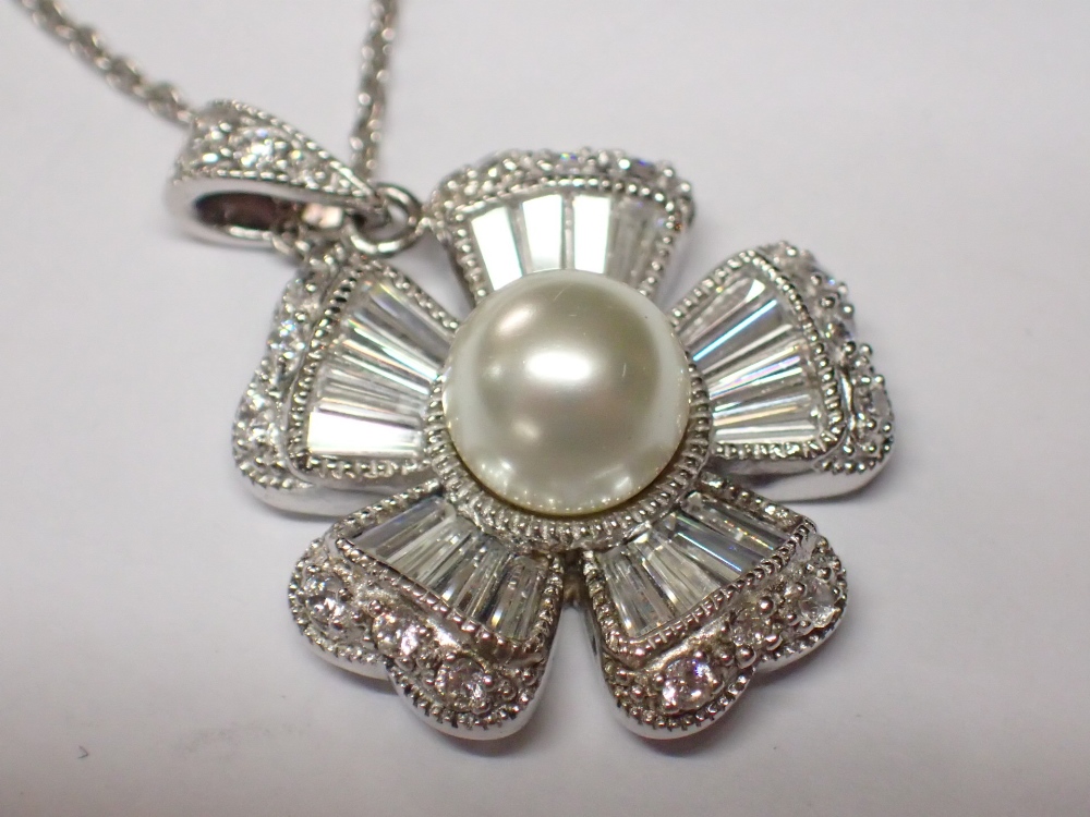 Silver faux pearl and cubic zirconia pendant on silver chain