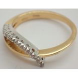 18ct gold and diamond cross over ring size O / P 4.