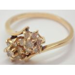 14ct gold diamond double flower head ring size R