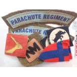 Box of fabric military badges