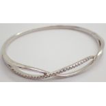 9ct white gold crossover diamond set bangle 11.